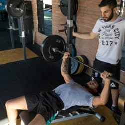 Two men doing bench press