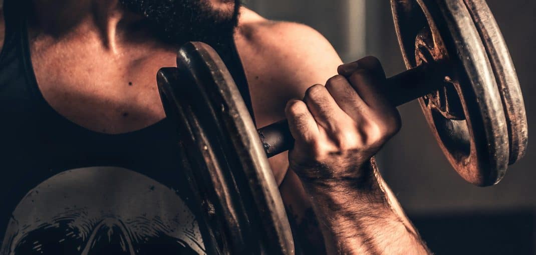 Men doing dumbbell bicep curls