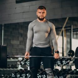 Strong man exercising at the gym