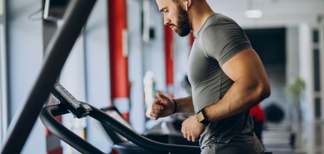 Strong man training in gym