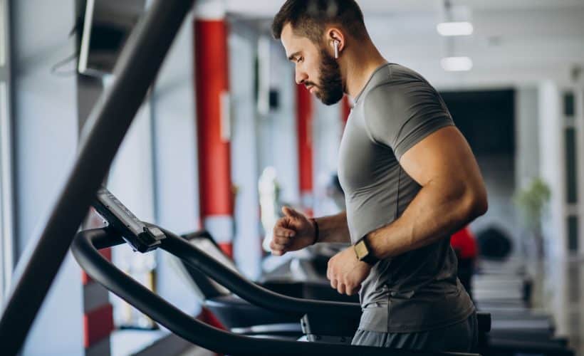 Strong man training in gym