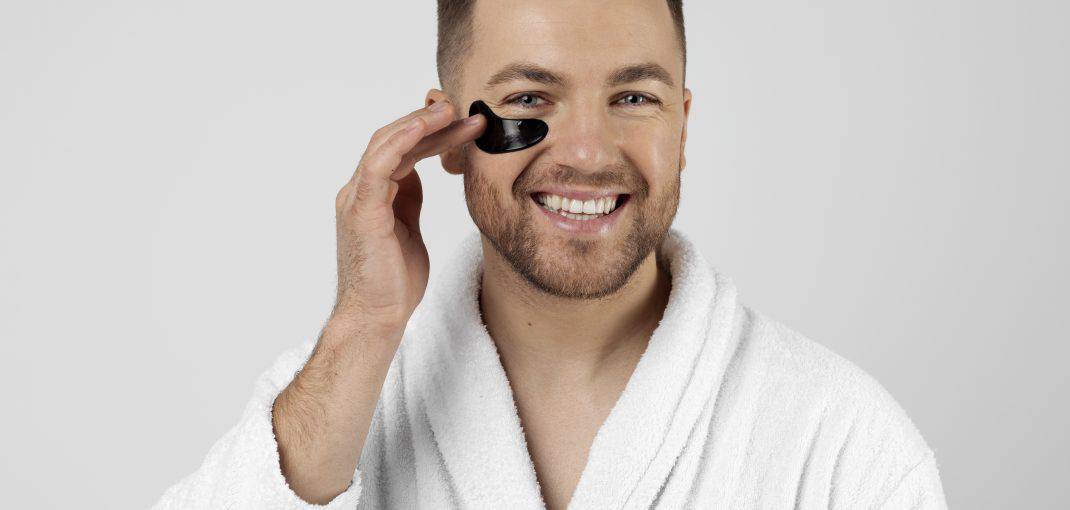 Young man doing skincare