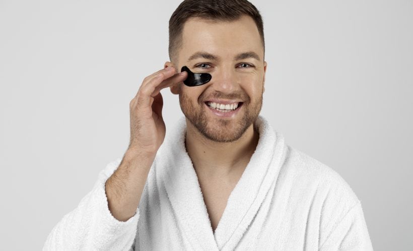 Young man doing skincare